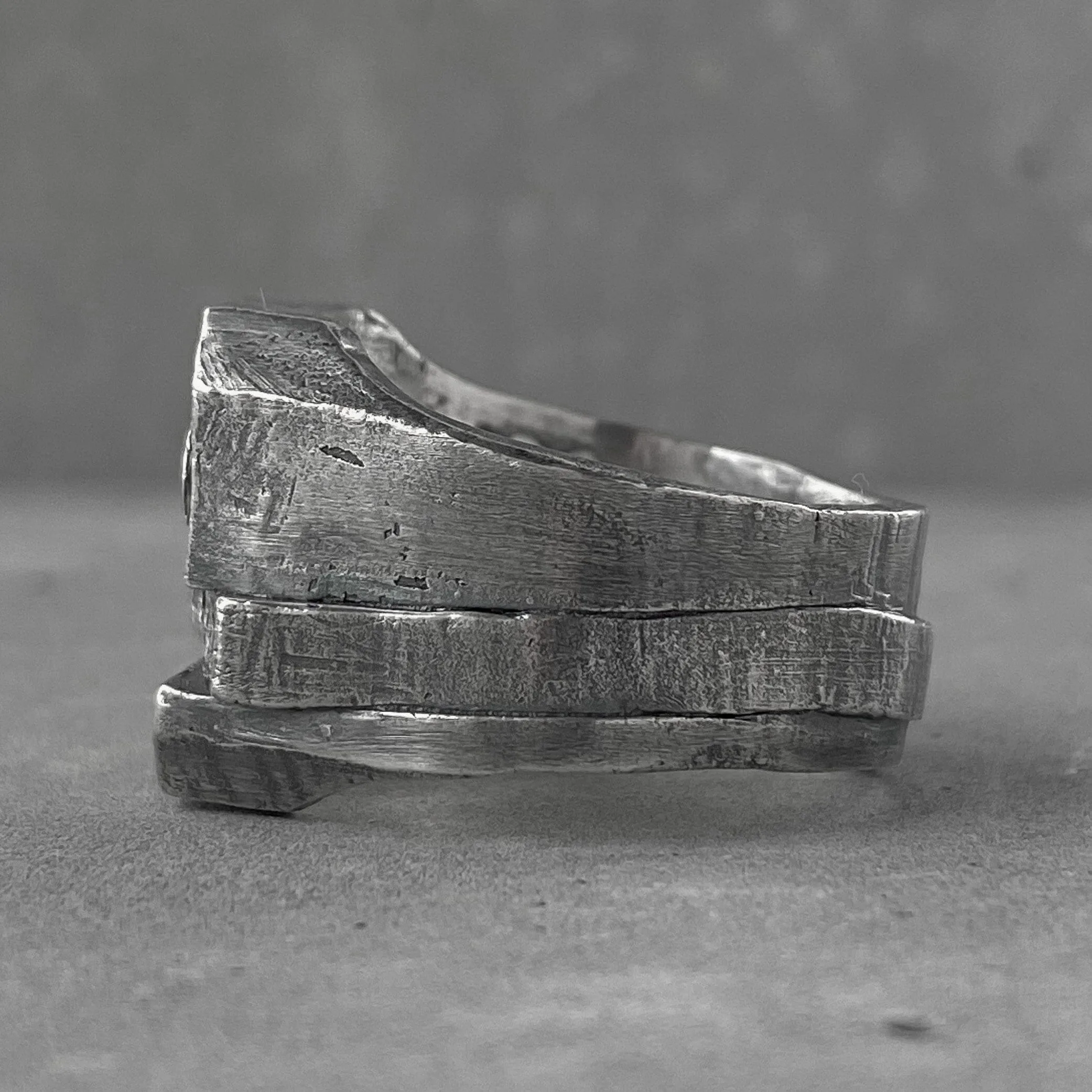 Babylon ring- textured square signet ring with five black diamonds