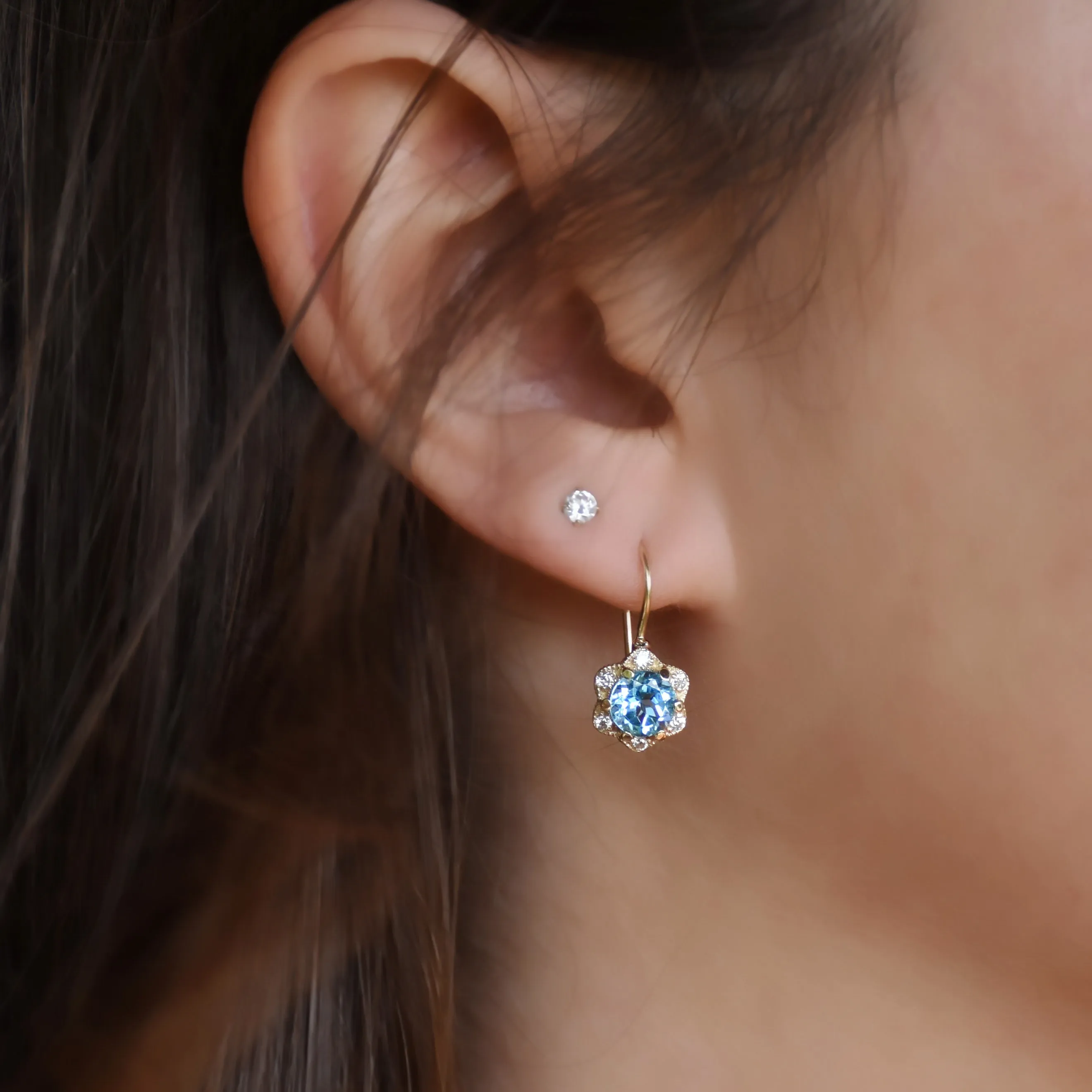 EG2228 Gold Flower Earrings with Blue Topaz