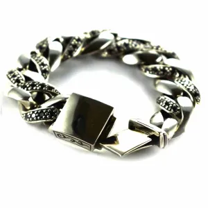 Silver bracelet with small onyx stone